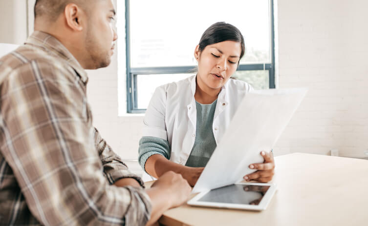 Man consulting to doctor for fertility issue