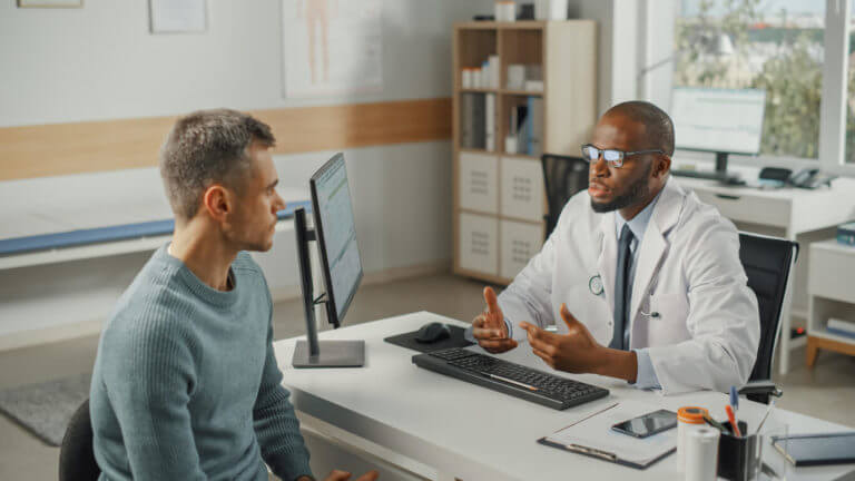 Urologist consultation for male patient for nonsurgical treatment for Peyronie's disease.